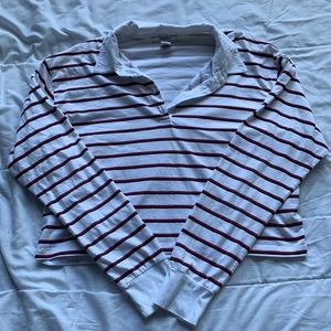 white, red, and black collared long-sleeve